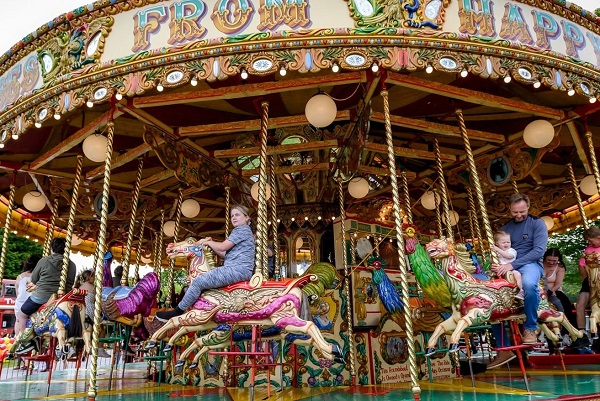 People enjoying the carousel ride